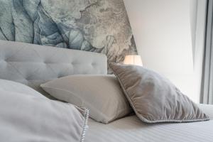 Posteľ alebo postele v izbe v ubytovaní Gąsienica Apartamenty Queen