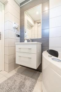Kúpeľňa v ubytovaní Gąsienica Apartamenty Queen
