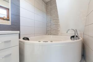 Kúpeľňa v ubytovaní Gąsienica Apartamenty Queen