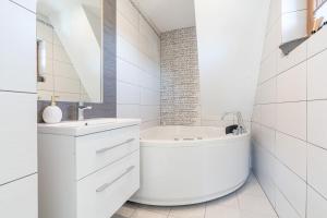 Kúpeľňa v ubytovaní Gąsienica Apartamenty Queen