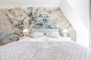 Posteľ alebo postele v izbe v ubytovaní Gąsienica Apartamenty Queen