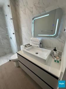 Koupelna v ubytování Grand O living + 37 fotografií