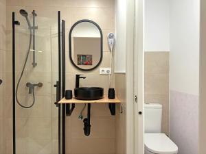 a bathroom with a sink and a shower at Estudio Amaia Licencia UAT01755 in Viana
