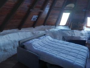 Voodi või voodid majutusasutuse Rifugio Ortobene toas