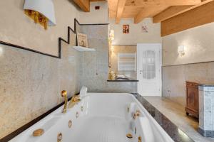 a large white tub in a bathroom with a sink at MUG7 -Sesto San Giovanni - Prestige House - in Sesto San Giovanni +30 photos