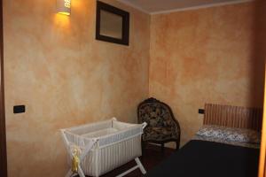 En eller flere senge i et værelse på Villa con piscina sul mare sud Sardegna