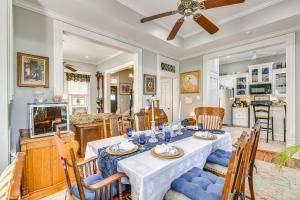 a dining room with a table and chairs at Walk to the Strand Hideaway Haven Retreat in Galveston