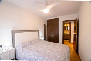 Postel nebo postele na pokoji v ubytování Apartament Alfaz del Pi