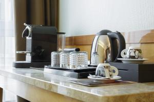 Příslušenství pro přípravu čaje a kávy v ubytování Hotel Teco