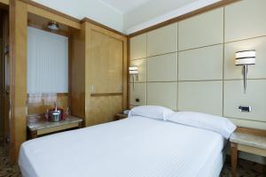 Postel nebo postele na pokoji v ubytování Hotel Teco