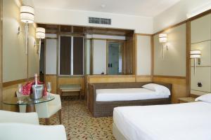 Postel nebo postele na pokoji v ubytování Hotel Teco