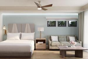 Ένα ή περισσότερα κρεβάτια σε δωμάτιο στο Hilton Vacation Club Mill Springs Lodge Pigeon Forge +47 φωτογραφίες