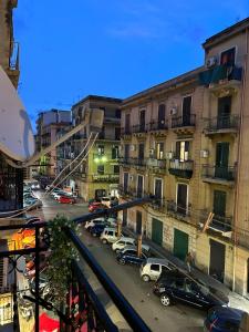 a view of a city street with parked cars at Sweet dreams in Palermo