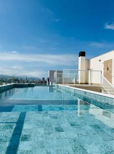 Hồ bơi trong/gần Condomínio Residencial Leblon - LW Locações Ubatuba