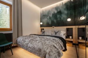 Posteľ alebo postele v izbe v ubytovaní ApartSerwis - Gorące Źródła Apartament Czerwone Wierchy