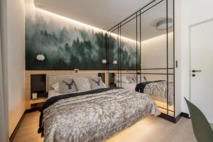 Posteľ alebo postele v izbe v ubytovaní ApartSerwis - Gorące Źródła Apartament Czerwone Wierchy