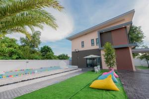 Zahrada ubytování Green Beach Pool Villa