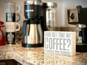 a sign that says how do i take my coffee on a counter at Gorgeous Home, Great Vibes & Nonstop Fun! in Desert Hot Springs