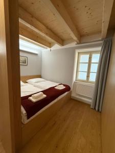 Posteľ alebo postele v izbe v ubytovaní Apartments Cafe Hexe
