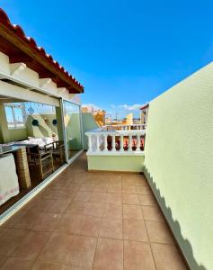 a balcony of a house with a view at Olivia in Barrio-Mar