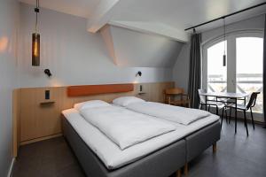 Postelja oz. postelje v sobi nastanitve Four Points Flex by Sheraton Koge
