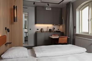 Postelja oz. postelje v sobi nastanitve Four Points Flex by Sheraton Koge