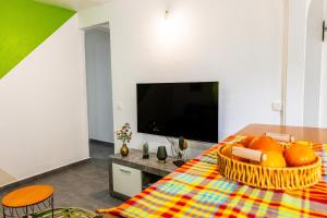 TV a/nebo společenská místnost v ubytování Appartement