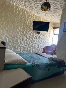 Postel nebo postele na pokoji v ubytování Ancla Hostal