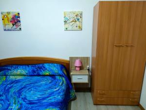 Postel nebo postele na pokoji v ubytování Casa Vacanze LIBECCIO Free private parking