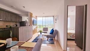 Kuchyň nebo kuchyňský kout v ubytování Apartamento familiar en Armenia Q