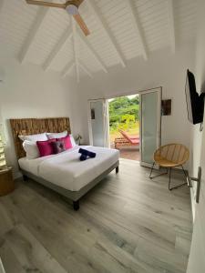 Postel nebo postele na pokoji v ubytování Arubana + 52 fotografií