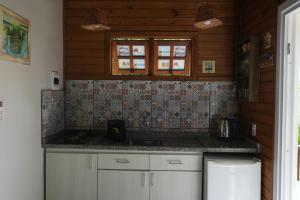 Kuchyň nebo kuchyňský kout v ubytování Pousada Morada Das Corujas