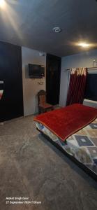 TV a/nebo společenská místnost v ubytování Sunset Backpackers Hostel + 37 fotografií