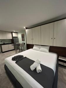 Voodi või voodid majutusasutuse Hotel Mariel Holbox toas