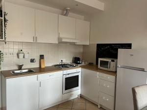 Η κουζίνα ή μικρή κουζίνα στο Casa Gaia Rome +16 φωτογραφίες