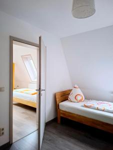 Postel nebo postele na pokoji v ubytování Gästehaus Wagner