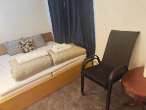 Postel nebo postele na pokoji v ubytování Orebro Hideaway