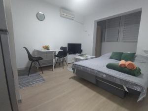 Voodi või voodid majutusasutuse Una Studio Apartman toas