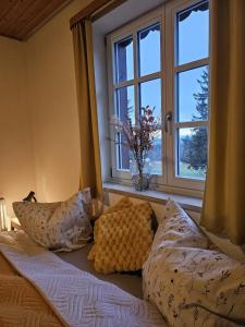 Ένα ή περισσότερα κρεβάτια σε δωμάτιο στο Marktredwitzer Haus