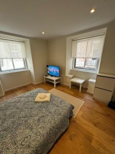 Postel nebo postele na pokoji v ubytování Very central location apartment