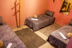 Letto o letti in una camera di Dar Mojo