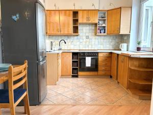 Η κουζίνα ή μικρή κουζίνα στο Real Life Apartament +3 φωτογραφίες