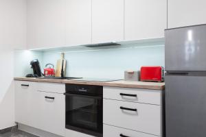 Η κουζίνα ή μικρή κουζίνα στο Apartamenty Stare Bielsko