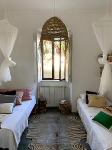 Ένα ή περισσότερα κρεβάτια σε δωμάτιο στο Casa da Mata