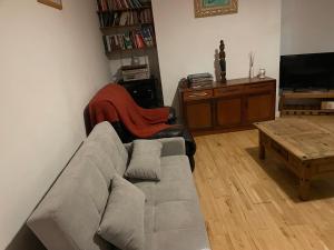 a living room with a couch and a coffee table at 123a Antrim Rd in Belfast +5 photos
