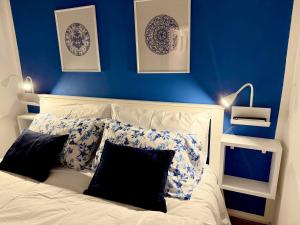 En eller flere senge i et værelse på Nova Holidays