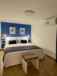 En eller flere senge i et værelse på Nova Holidays