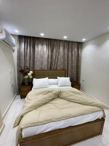 Postel nebo postele na pokoji v ubytování Families Inn
