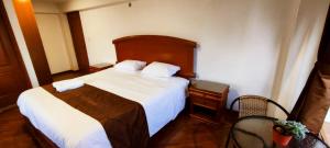 Letto o letti in una camera di Elsa Wasi Cusco
