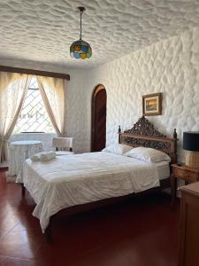 Postel nebo postele na pokoji v ubytování Ancla Hostal + 5 fotografií